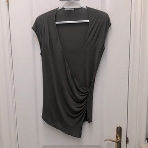 Sarah Pacini taupe top.